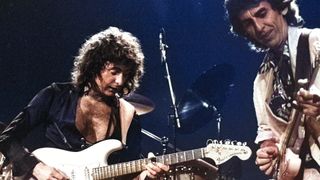 Ritchie Blackmore performs onstage with George Harrison on Deep Purple's Perfect Strangers World Tour at the Entertainment Centre, Sydney, Australia, December 12, 1984. 