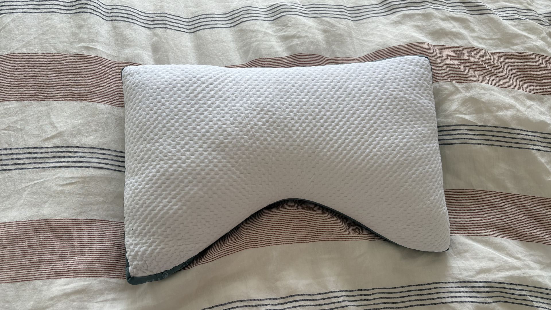 Testing the Eli &amp;amp; Elm Ultimate Side Sleeper Pillow, showing it on the bed