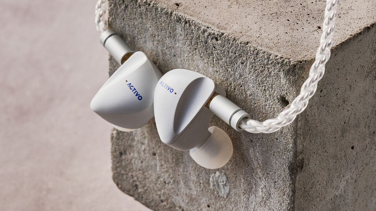 Activo Scoop earbuds hanging on block