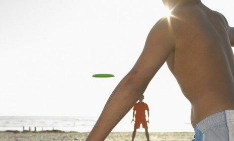 A new Los Angeles law forbids Frisbee throwing on the beach during the prime summer months. Volleyballs? No problem.