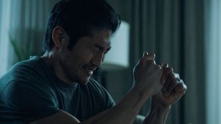 Clarke (Brian Tee) crying in Expats episode 5