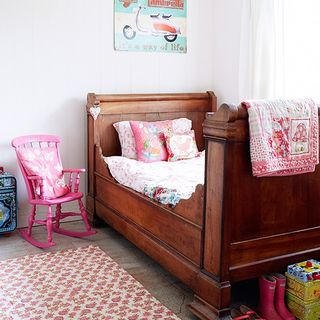 girly bedroom sleigh bed and pink rocking chair