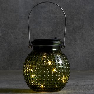 solar jar light with green color and design