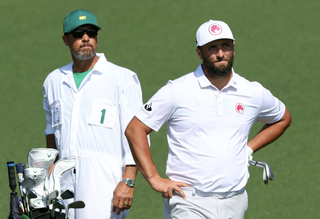 Jon Rahm and his caddie at The Masters