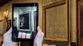 Image of a painting overlaid on a physical frame using augmented reality