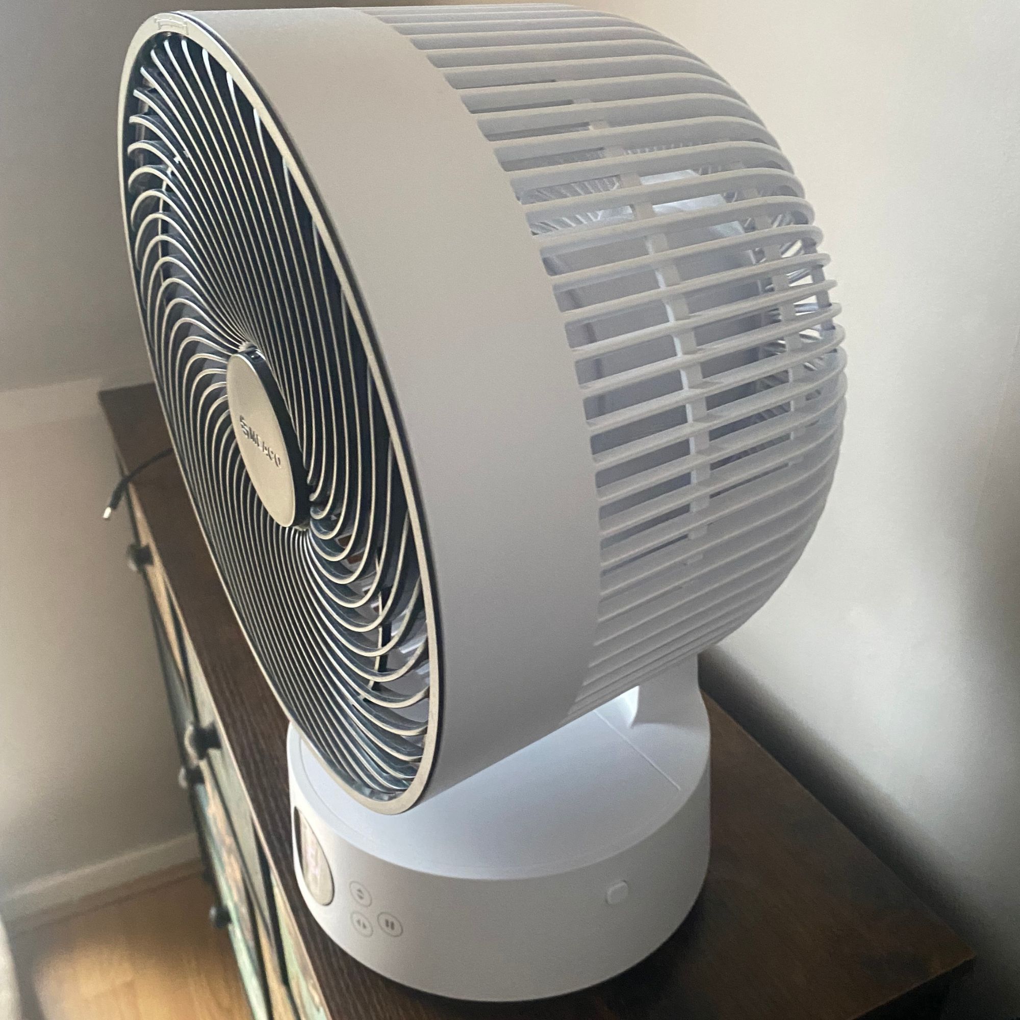 Meaco Sefte Pro table top air circulator side profile on a sideboard