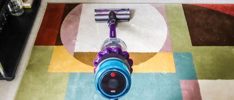 Dyson Gen5 Detect being used on a rug