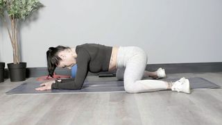 Sam Hopes performing a frog pose