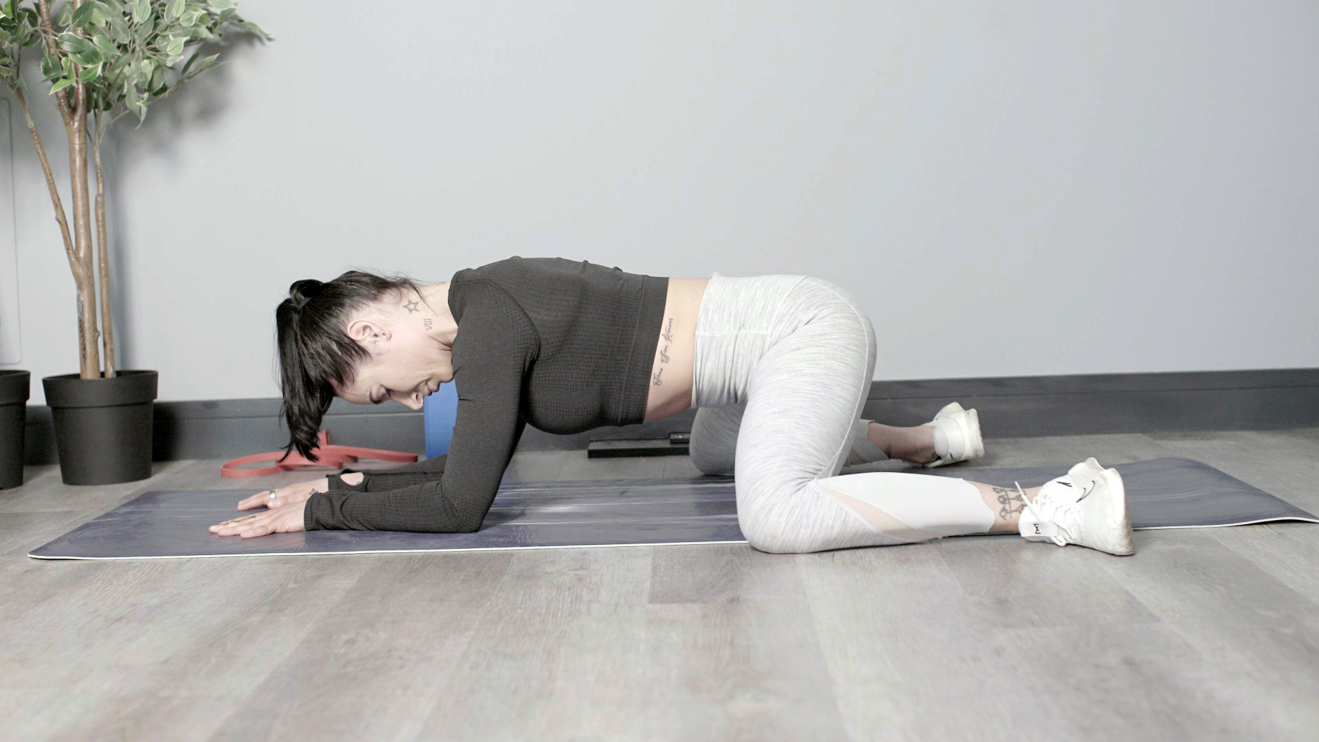 Sam Hopes performing a frog pose