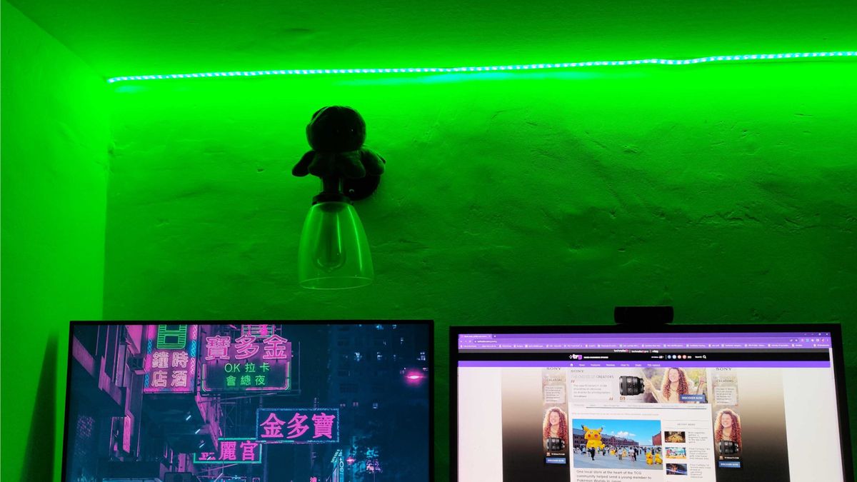 A workspace lit by a smart light in green