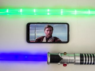 Obi Wan Kenobi with lightsabers