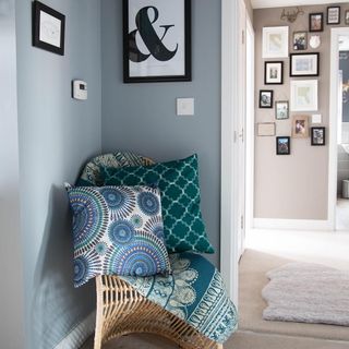 grey wall with corner and cushions
