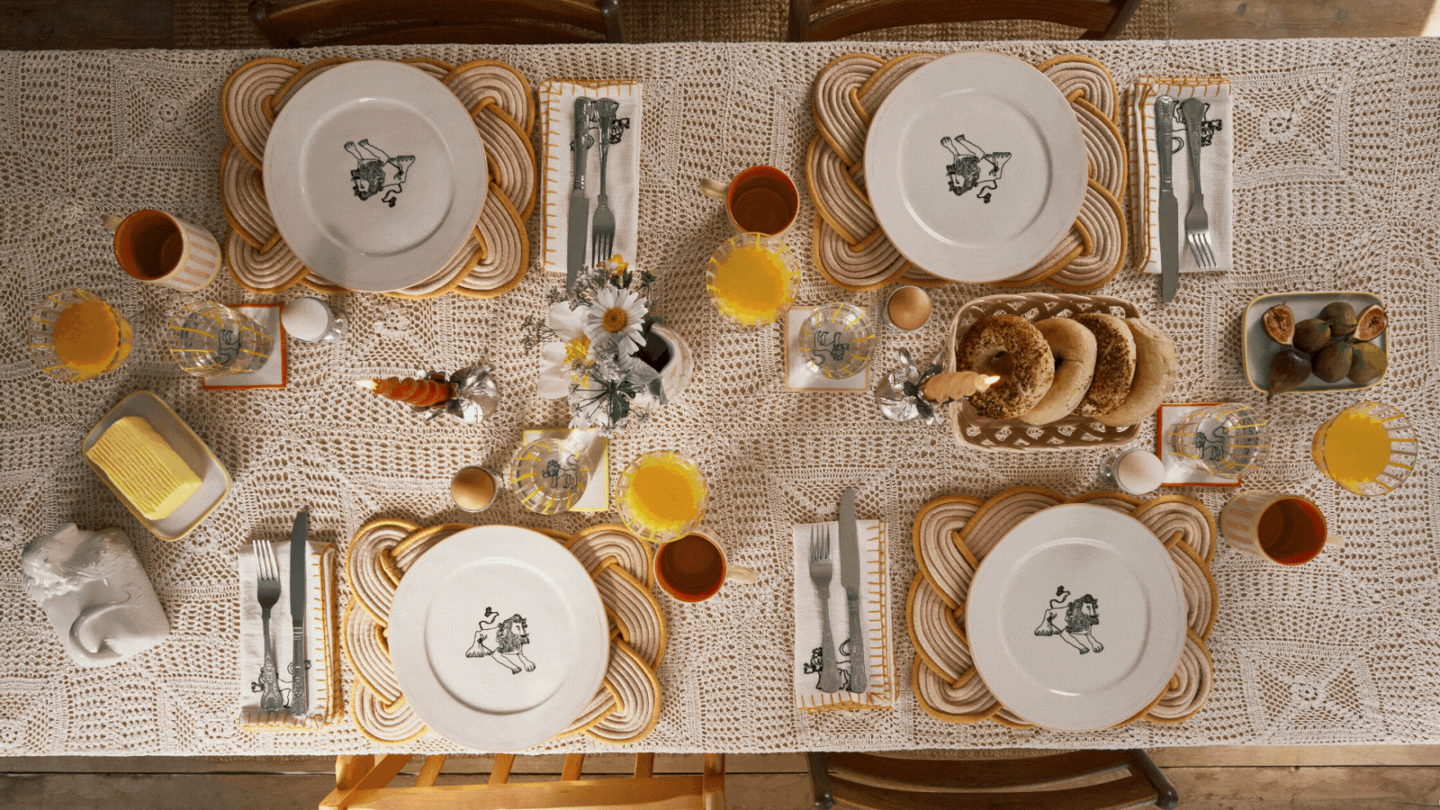 Rotating four images of a table set with a crochet tablecloth and different brunch-inspired tableware.