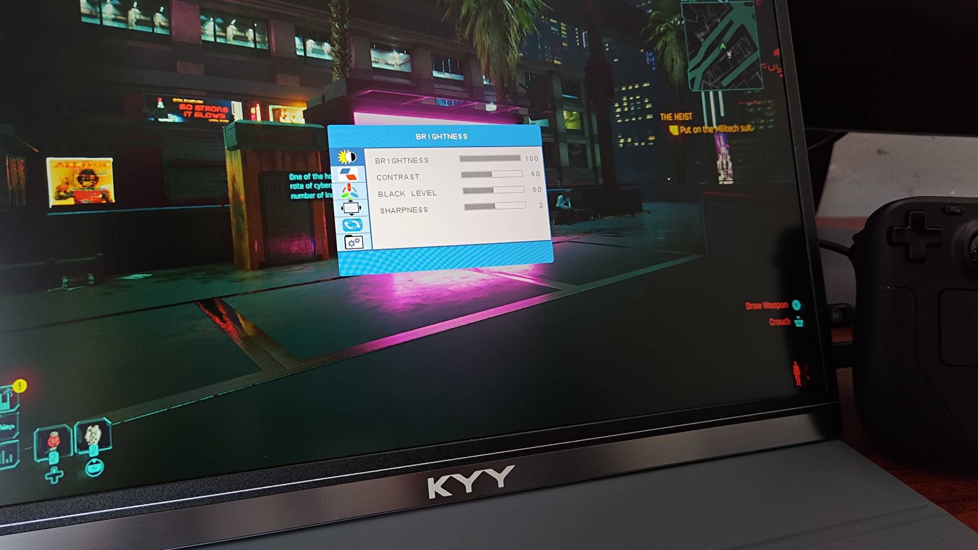 Close up of KYY K3 Portable Monitor OSD menu with Cyberpunk 2077 gameplay behind options.