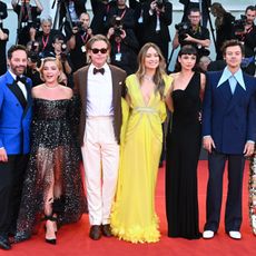 Nick Kroll, Florence Pugh, Chris Pine, Olivia Wilde, Sydney Chandler, Harry Styles and Gemma Chan attend the "Don't Worry Darling" red carpet at the 79th Venice International Film Festival on September 05, 2022 in Venice, Italy.