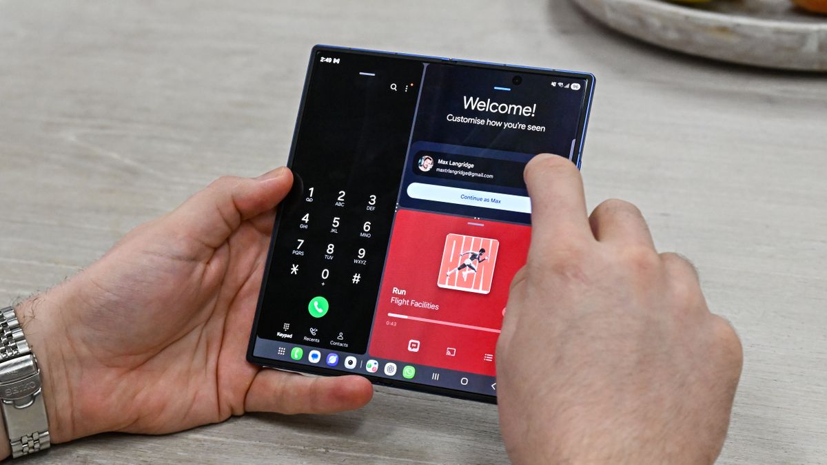 Someone using the Samsung Galaxy Z Fold 7 when unfolded, with three separate apps open at once.