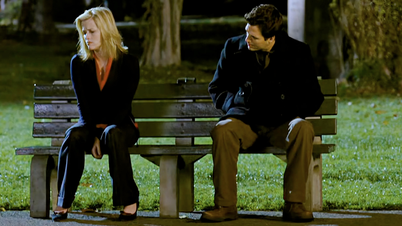 Reese Witherspoon and Mark Ruffalo sit on a New York City bench at night in 2005's Just Like Heaven.