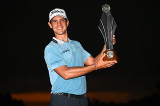 Matteo Manassero poses with the Jonsson Workwear Open trophy in 2024