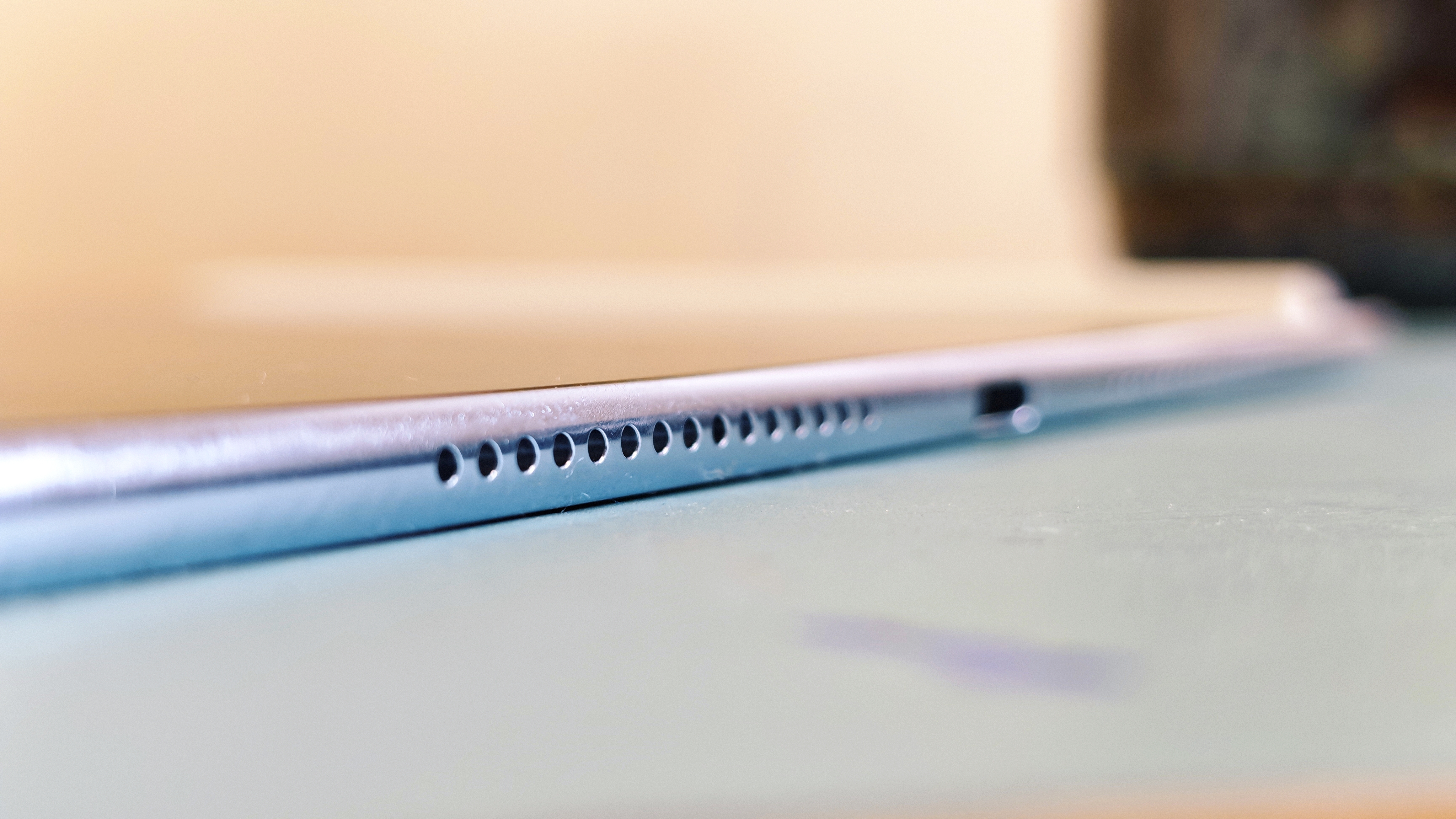 A Huawei MatePad Pro Max tablet on a blue-green table