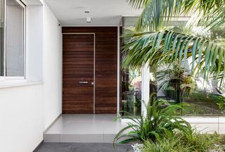 Modern wooden front door by Oikos