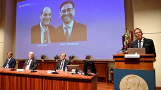 Thomas Perlmann, the Secretary of the Nobel Committee, announcing the winners during a press conference at the Karolinska Institute in Stockholm.