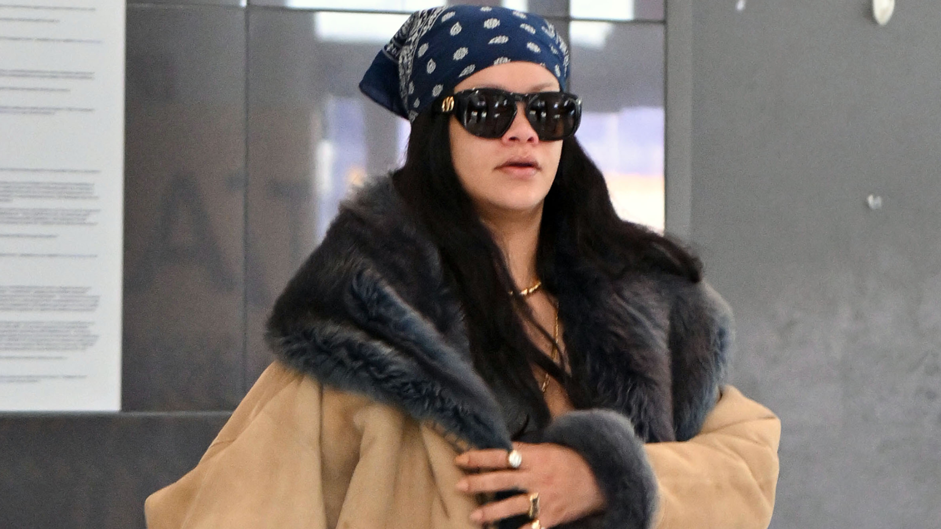 Rihanna was spotted at the airport in Jennifer Lawrence's favorite airport book tote bag from Dior