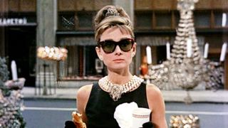 The movie "Breakfast at Tiffany's", directed by Blake Edwards and based on the novel by Truman Capote. Seen here, Audrey Hepburn as Holly Golightly during the opening sequence, pausing in front of Tiffany's jewelry store in New York City. Initial theatrical release October 5, 1961.