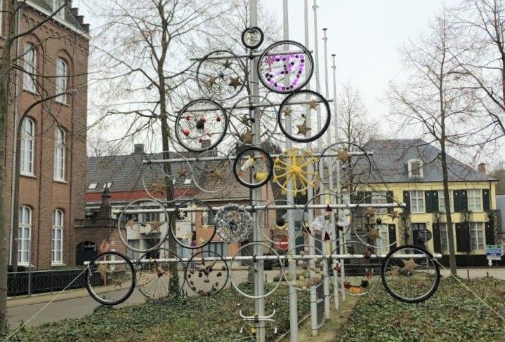 Bike Wheel Chrismas Tree in Vorselaar, Belgium near forest where group has trained