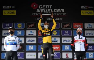 WEVELGEM BELGIUM MARCH 28 Podium Giacomo Nizzolo of Italy and Team Qhubeka Assos Wout Van Aert of Belgium and Team Jumbo Visma Matteo Trentin of Italy and UAE Team Emirates Celebration during the 83rd GentWevelgem in Flanders Fields 2021 Mens Elite a 254km race from Ypres to Wevelgem Trophy Celebration Mask Covid Safety Measures GWE21 GWEmen FlandersClassic on March 28 2021 in Wevelgem Belgium Photo by Tim de WaeleGetty Images