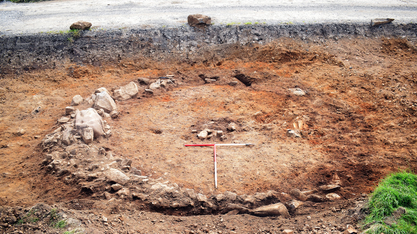 A ring of rocks surrounds the urns that archaeologists found.