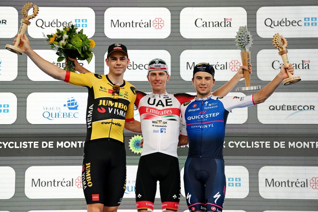 MONTREAL QUEBEC SEPTEMBER 11 LR Wout Van Aert of Belgium and Team Jumbo Visma on second place race winner Tadej Pogacar of Slovenia and UAE Team Emirates and Andrea Bagioli of Italy and Team QuickStep Alpha Vinyl on third place pose on the podium during the podium ceremony after the 11th Grand Prix Cycliste de Montreal 2022 a 221km one day race from Montreal to Montreal GPCQM WorldTour on September 11 2022 in Montreal Quebec Photo by Dario BelingheriGetty Images