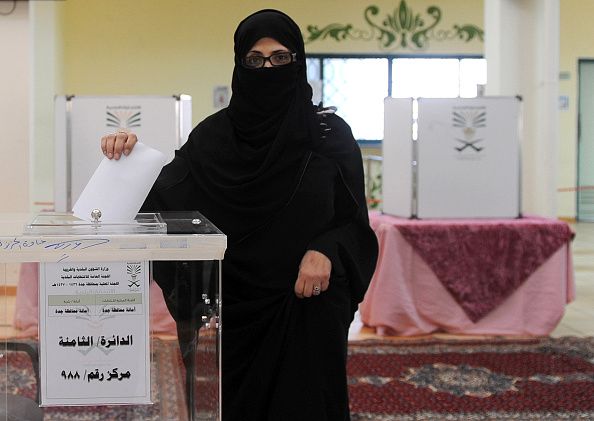 A Saudi Arabian woman casts her vote for the first time Saturday. 