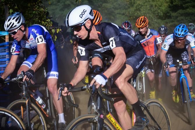 Mike Garrigan (Van Dessel) in a crowd on lap one