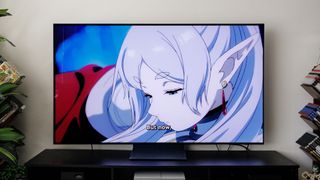 Samsung S90F OLED TV on a cabinet