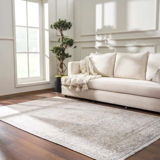 A Cream Holi-2301 Washable Area Rug in a white modern living room