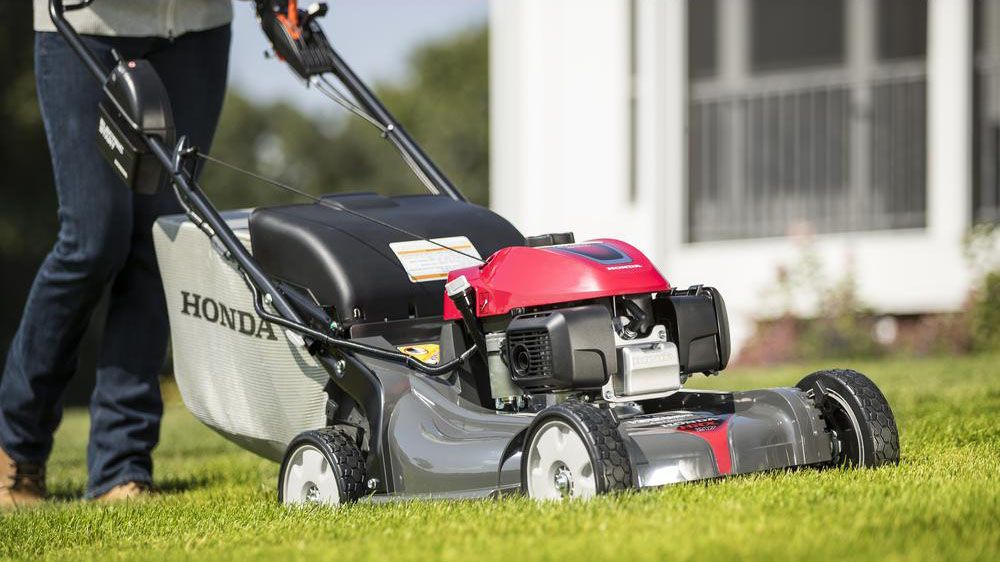 electric lawn mower blade hard to turn by hand