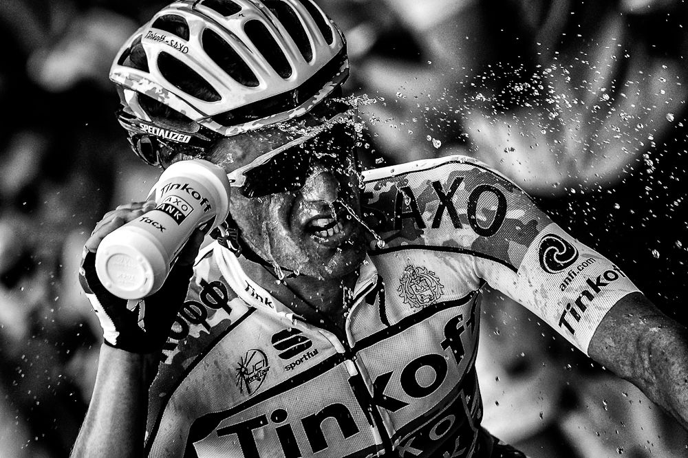 Rafal Majka cools himself down on the way to winning stage 11.