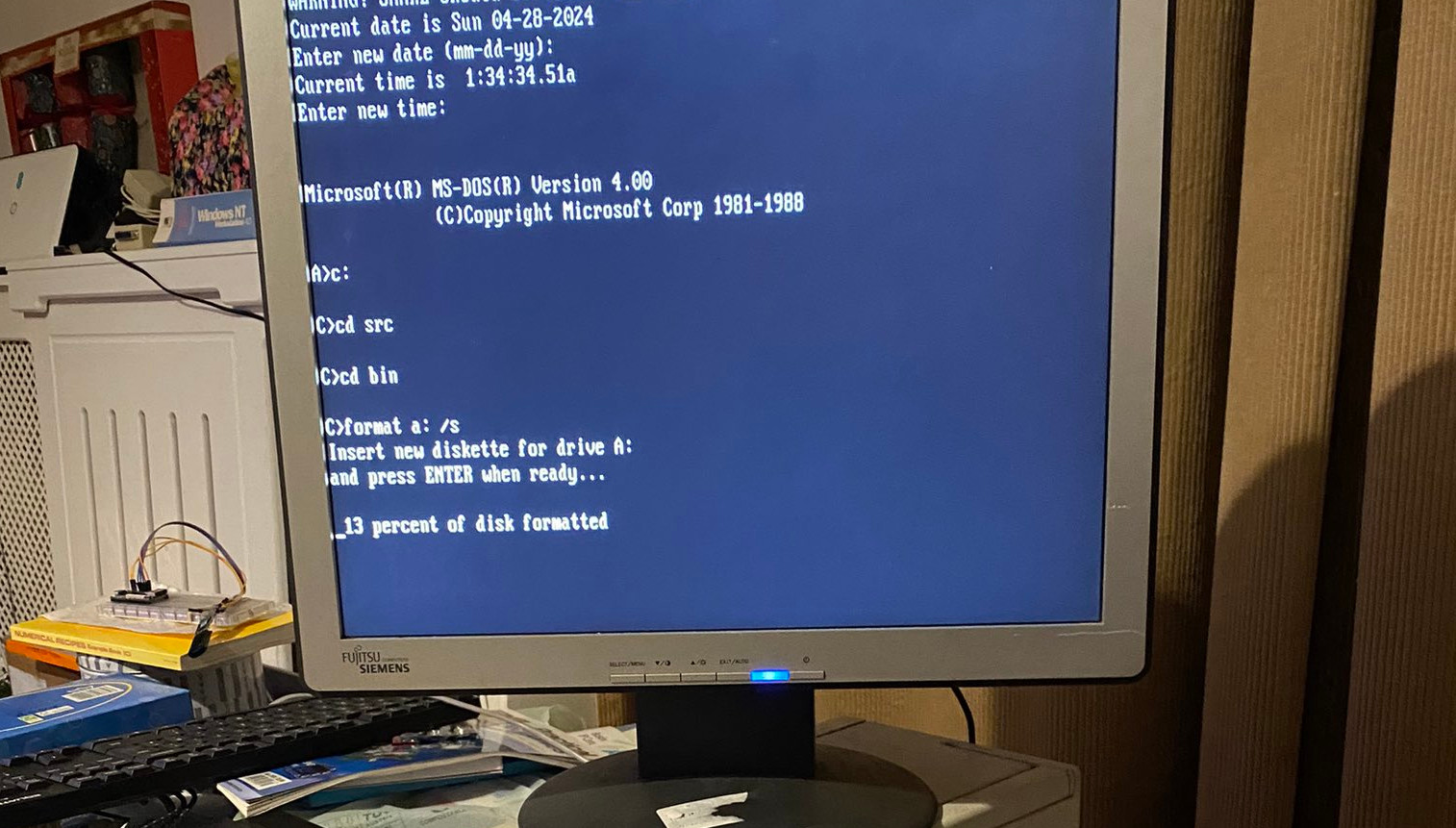 Newly open-sourced MS-DOS 4 installed  on an IBM Personal System/2 with a 16 MHz Intel 386 CPU — took 70 minutes to build