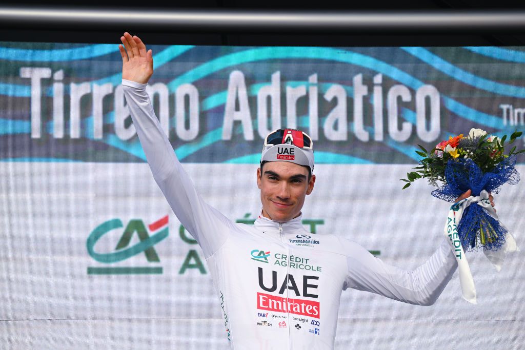 FOLLONICA ITALY MARCH 05 Juan Ayuso of Spain and UAE Emirates Team celebrates at podium as White best young jersey winner during the 59th TirrenoAdriatico 2024 Stage 2 a 198km stage from Camaiore to Follonica UCIWT on March 05 2024 in Follonica Italy Photo by Tim de WaeleGetty Images