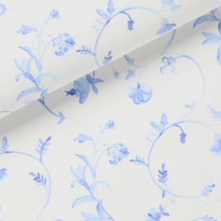 White wallpaper with blue floral design