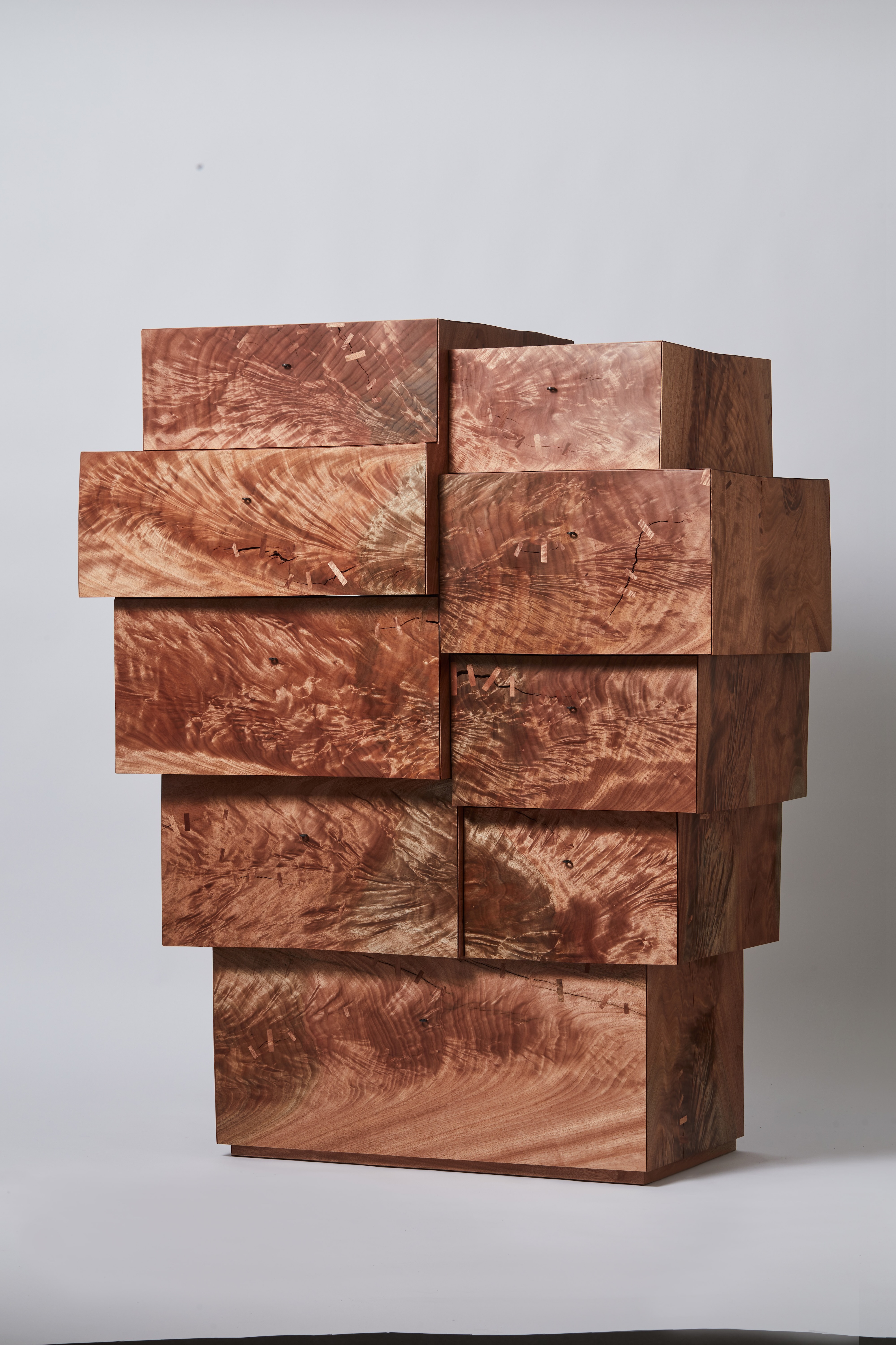 sculptural wood cabinet