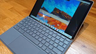 HP Chromebook x2 11 review: a photo of a Chromebook on a wooden table