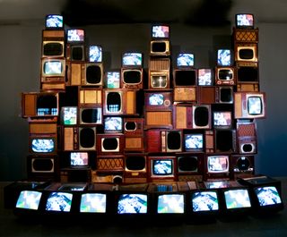 A wall of old style tv's