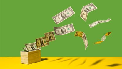 Stack of US $1 bills with bills flying away on yellow shelf, green background