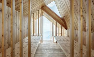 The shelter is made of larch and has minimalist furniture