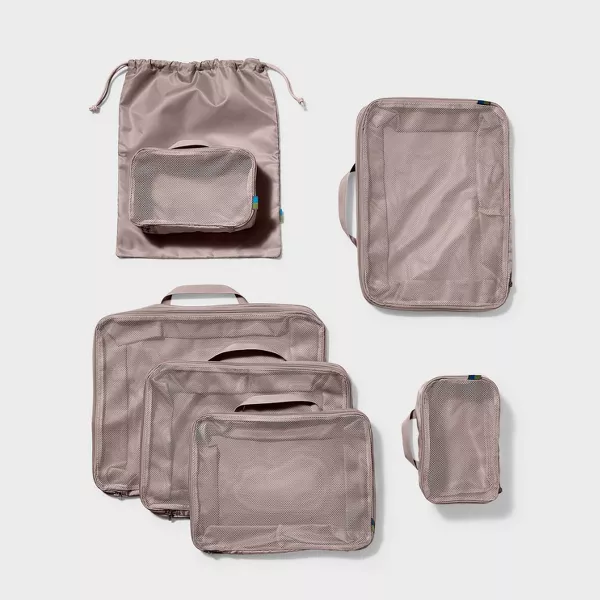 Pale pink packing cubes. 