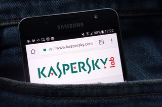Kaspersky's antivirus software on a smartphone in someone's pocket