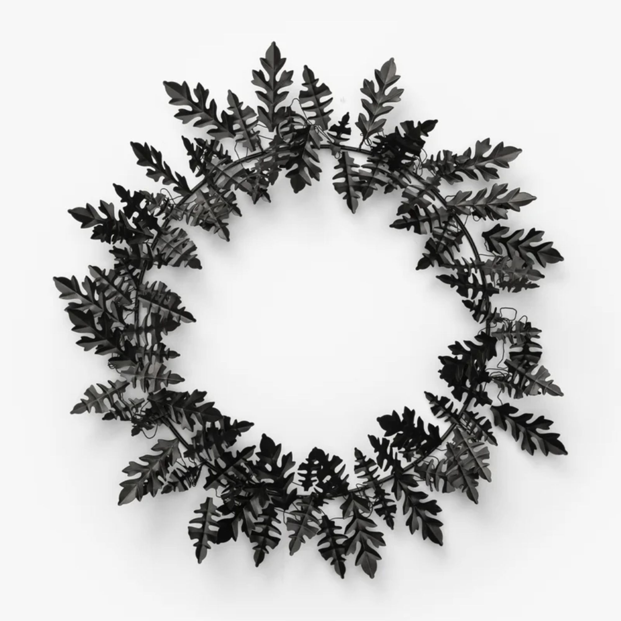 Black metal faux floral wreath