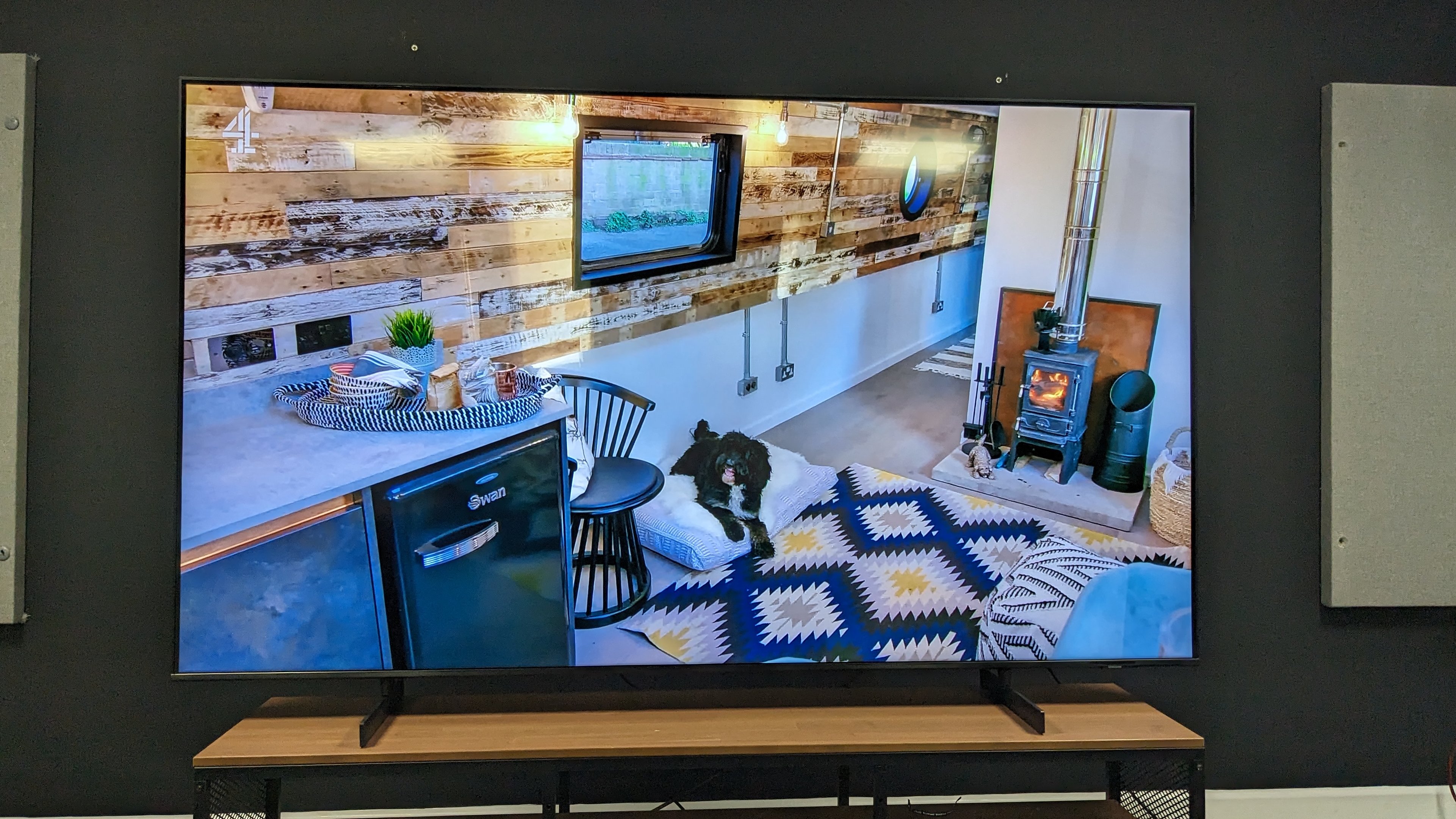 Samsung CU8000 with dog and living room on screen from HD live TV