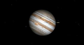 io's black shadow and grs on Jupiter night sky september 2019